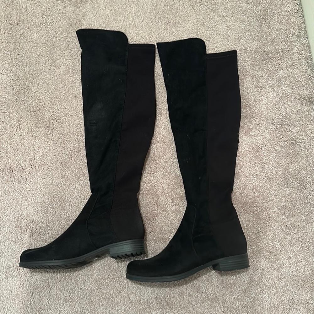High boots.